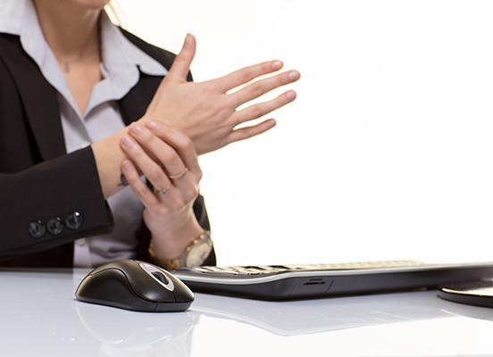 Business woman with wrist pain
