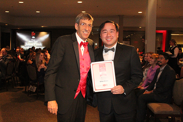 Tuan Bui, M.D., accepts award