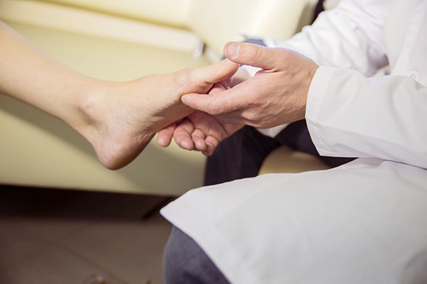 Foot Doctor with Elderly Patient