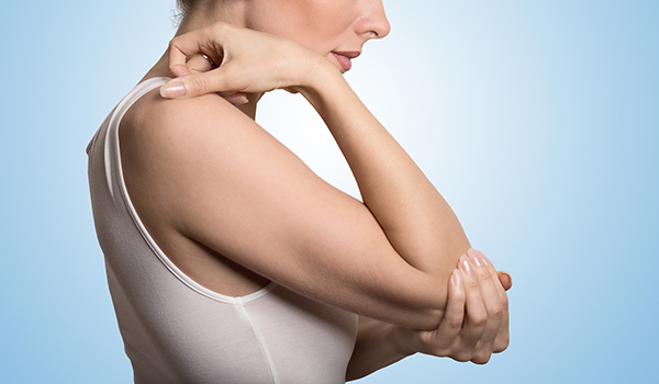 Woman with elbow pain